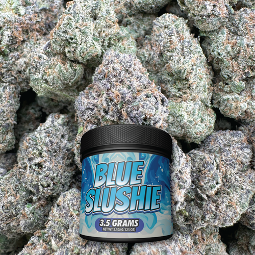 Container labeled 'Blue Slushie' surrounded by cannabis buds